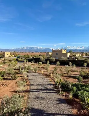 a dirt road in the middle of the desert at Luxury VILLA - Pool-view Atlas-Ourika-Golfs in Akkara