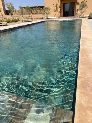 a swimming pool with clear blue water at Luxury VILLA - Pool-view Atlas-Ourika-Golfs in Akkara