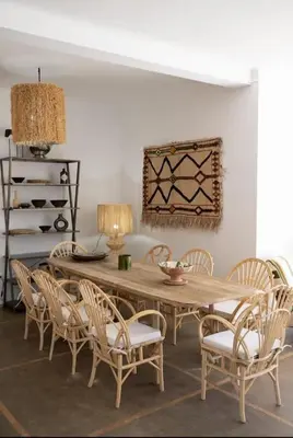 a dining room with a wooden table and chairs at Luxury VILLA - Pool-view Atlas-Ourika-Golfs in Akkara