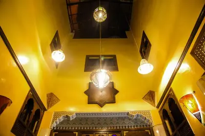 a ceiling with lights and a star on it at Dar Berrada-Ziat in Fès