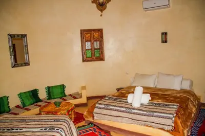 a bedroom with two beds in a room at Skoura Lodge in Skoura