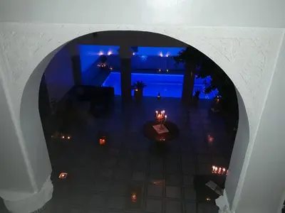 an overhead view of a room with a table and lights at Riad Amor - Suite & Spa in Fès