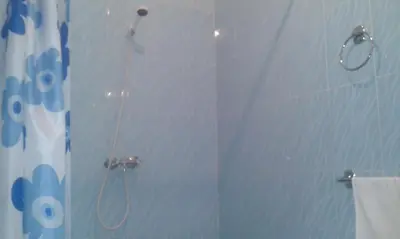 a bathroom with a shower with a shower curtain at Hotel School Ersat Azrou in Azrou