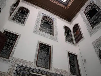 an image of a room with windows and doors at Dar El Arfaoui in Fès