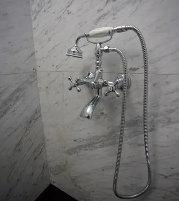 a shower head on a wall in a bathroom at Riad Vega in Fès
