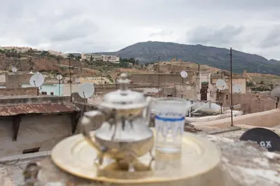 a glass jar on top of a building at Dar benelmahi in Fès
