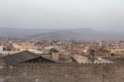 a view of a city from the top of a building at Dar benelmahi in Fès