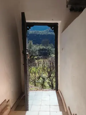 an open door to a room with a view at Chez Yahia, Au coeur de L'Ourika in Ourika