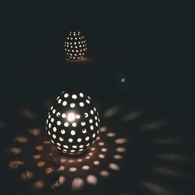 two spheres with lights in the dark at Madu Luxury Desert Camp in Merzouga
