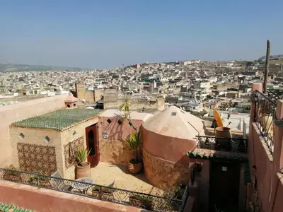 a view of a city from the roof of a building at Les Bains de Fez Tara in Fès