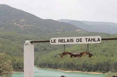 a street sign that reads le relias de tahla at Relais De Tahla in Ain Boumahdi