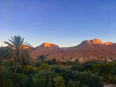 a view of the desert with mountains in the background at Luna del fuego in Ifri