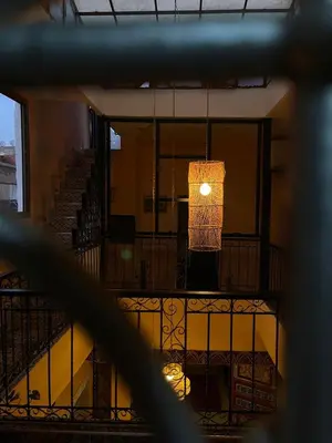 an overhead view of a balcony with a chandelier at la Kasbah salam in Fès