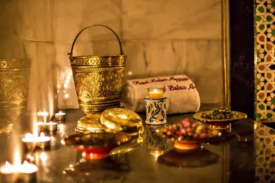 a table with candles and other items on it at Riad Marjana suites & Spa in Fès
