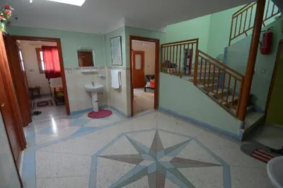 a bathroom with a star pattern on the floor at Hotel Imilchil in Zaouiat Cheikh