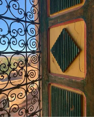 a close up of a window with a grate at Hike and Chill Homestay in Tinerhir