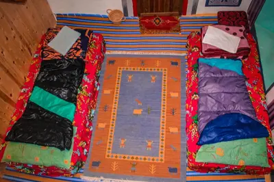 two beds sitting on top of a table at Hike and Chill Homestay in Tinerhir