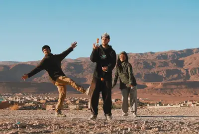a group of people standing on top of a mountain at Hike and Chill Homestay in Tinerhir