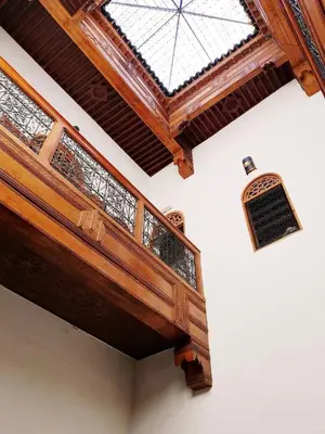a skylight in a building with a wooden ceiling at Riad Inspira in Meknès