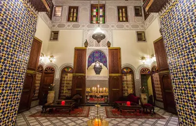 a large room with a altar in a building at Riad Ibn Khaldoun in Fès