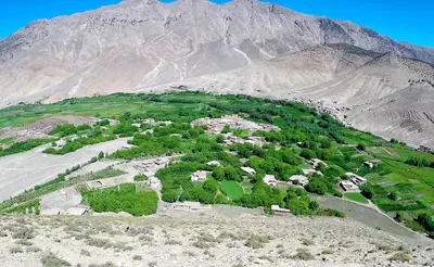 an aerial view of a village on a mountain at La Kasbah du M'goun in Timit