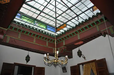 a ceiling with a chandelier in a room at La Colombe Blanche in Moulay Idriss Zerhoun