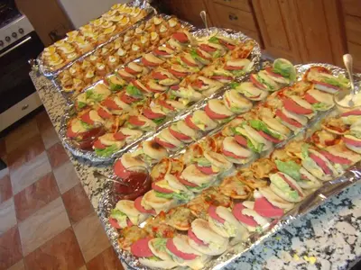 a bunch of trays filled with different types of food at Villa TYCOZ in Marrakech