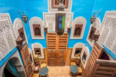 an aerial view of a building with a clock tower at Riad Hiba in Meknès
