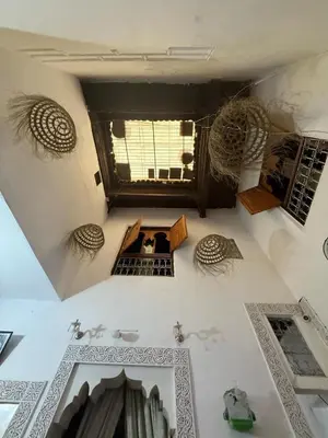 an overhead view of a room with a room with a room at Dar Elkorchi in Fès
