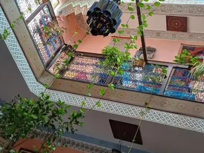 an overhead view of a building with potted plants at Riad Idrissi in Meknès