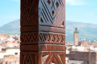 a wooden pole with a view of a city at Riad-Boutique Borj Dhab Fez in Fès