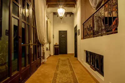 an empty hallway with a door and a hallway sidx sidx at Villa Septha in Marrakech