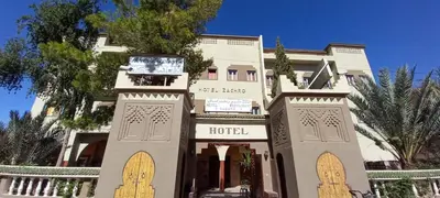 a building with a hotel in front of it at Hôtel Zaghro in Ouarzazate