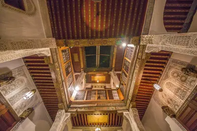 an overhead view of a spiral staircase in a building at Riad Gzira Fez in Fès