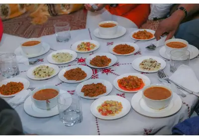 a table full of plates of food on a table at Riad Gzira Fez in Fès