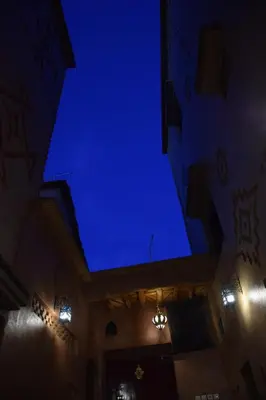 a blue ceiling in a building with lights at Kasbah Assafar in Kalaat MGouna