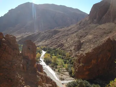 a view of a canyon with a river at A Secret Garden in Tinerhir
