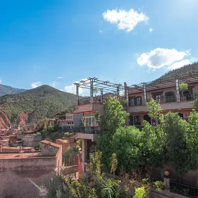 an apartment building with a balcony on top of it at Dar Soulaimane in Marrakech