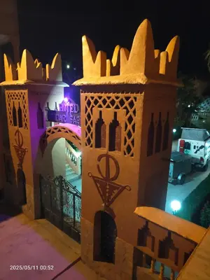 a model of a castle at night at Hotel Mandar Saghrou Tazakhte in Kalaat MGouna