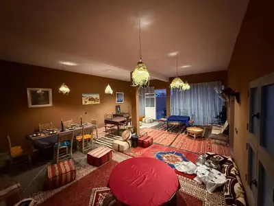 an overhead view of a living room with a red umbrella at Dar Talhaya in Kasr Bounou