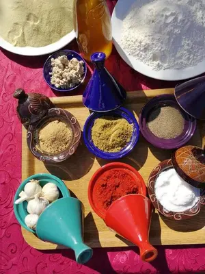 a table with different types of spices and ingrediants at Riad Sidi Hicham in Marrakech