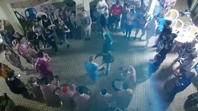 an overhead view of a crowd of people in a room at Youth Hostel International Fez in Fès