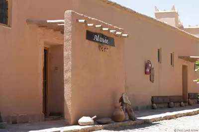 a person is standing outside of a building at Kasbah Baha Baha in Nkob