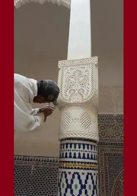 a man standing next to a large vase at Riad Sheryne Fes in Fès