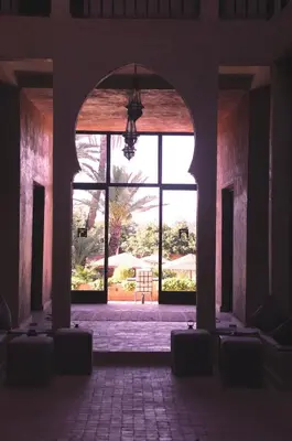 an empty room with a large window in a building at Dar Chamaa in Ouarzazate