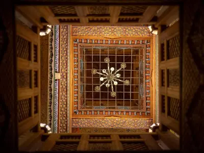 a window in a room with a clock on it at Dar Mfaddel in Fès