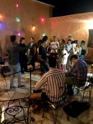 a group of people standing around in a room at Kasbah Rayane Ait Ben Haddou in Aït Ben Haddou