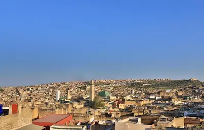 an aerial view of a city with buildings at La Cheminée Bleue Fes in Fès