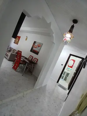 an overhead view of a living room with a chandelier at Ryan 3 in Fès