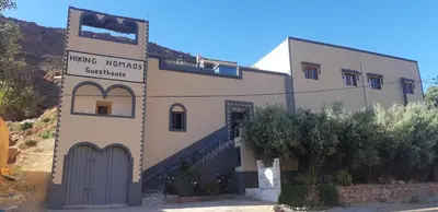 a building with a door in front of it at Hiking Nomads Guesthouse in Tamellalt